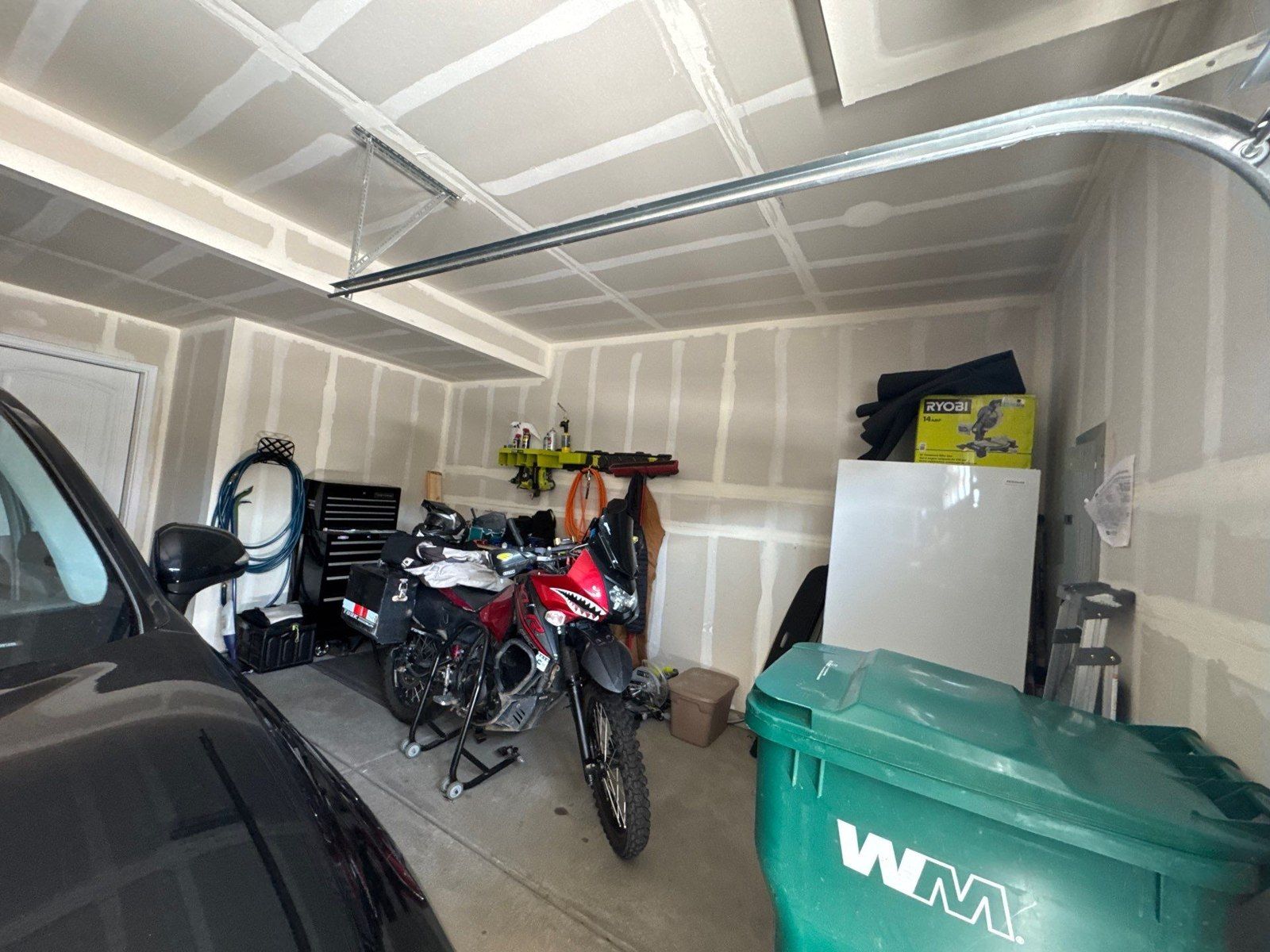 Garage walls and ceiling with visible drywall seams in a Colorado Springs texture and painting estimate