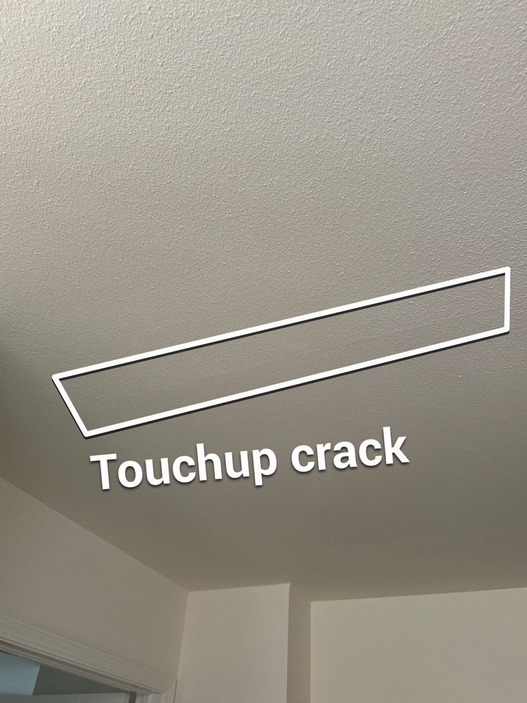 Ceiling crack outlined for a touch-up in an actual Monument painting estimate