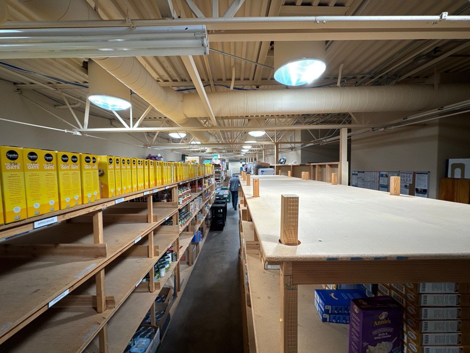 Existing aisle and shelving in the commercial interior attached to a Monument floor-coating proposal