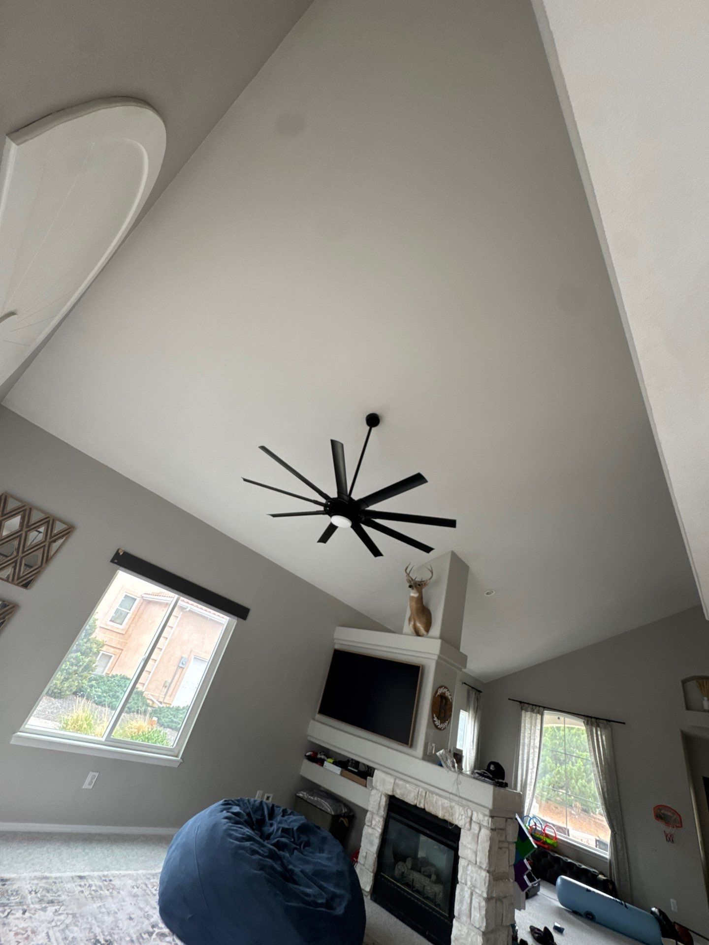 Vaulted living-room ceiling and existing room surfaces attached to the Colorado Springs estimate