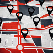 Stylized city map with multiple black location pins and red highlighted routes