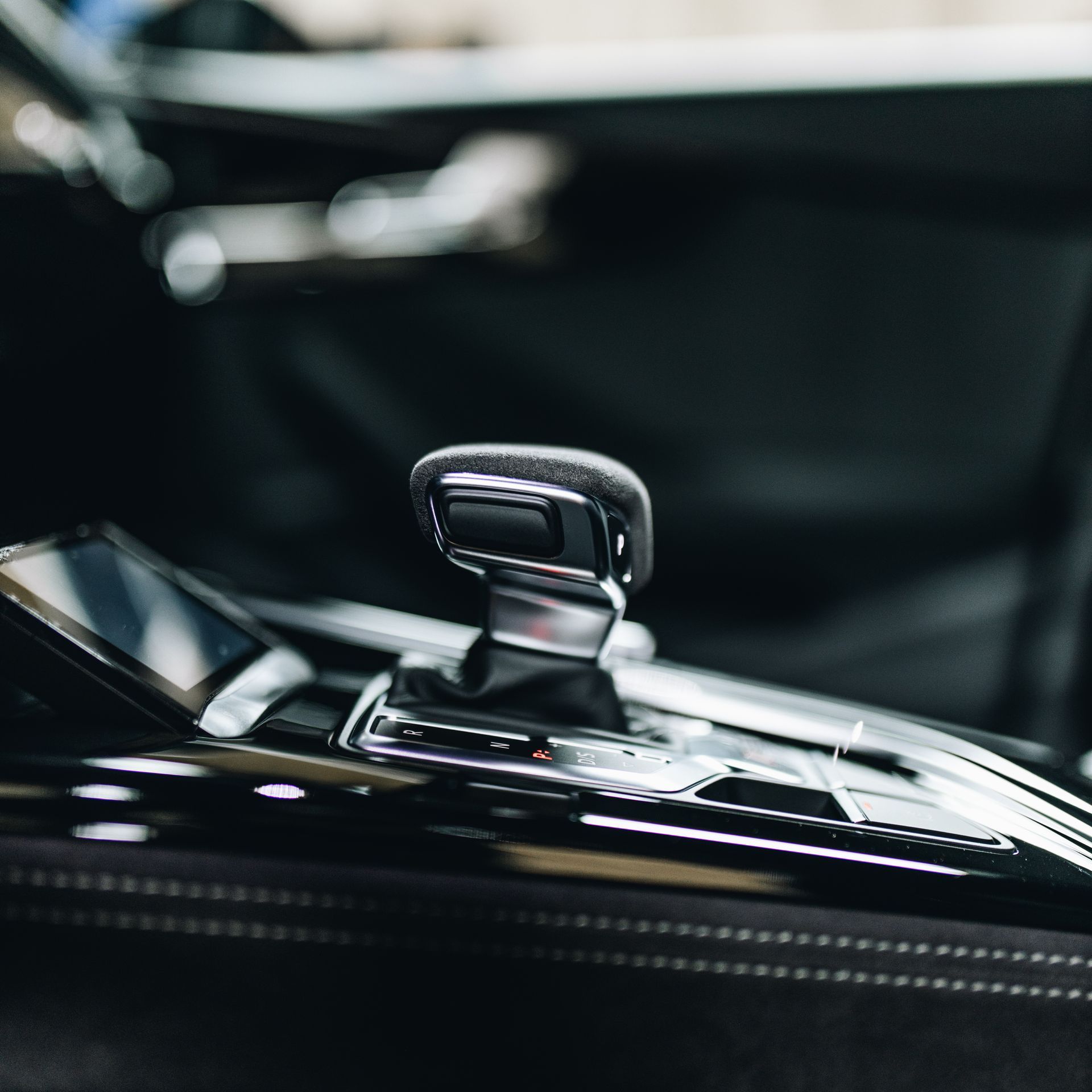A close up of a shifter in a car
