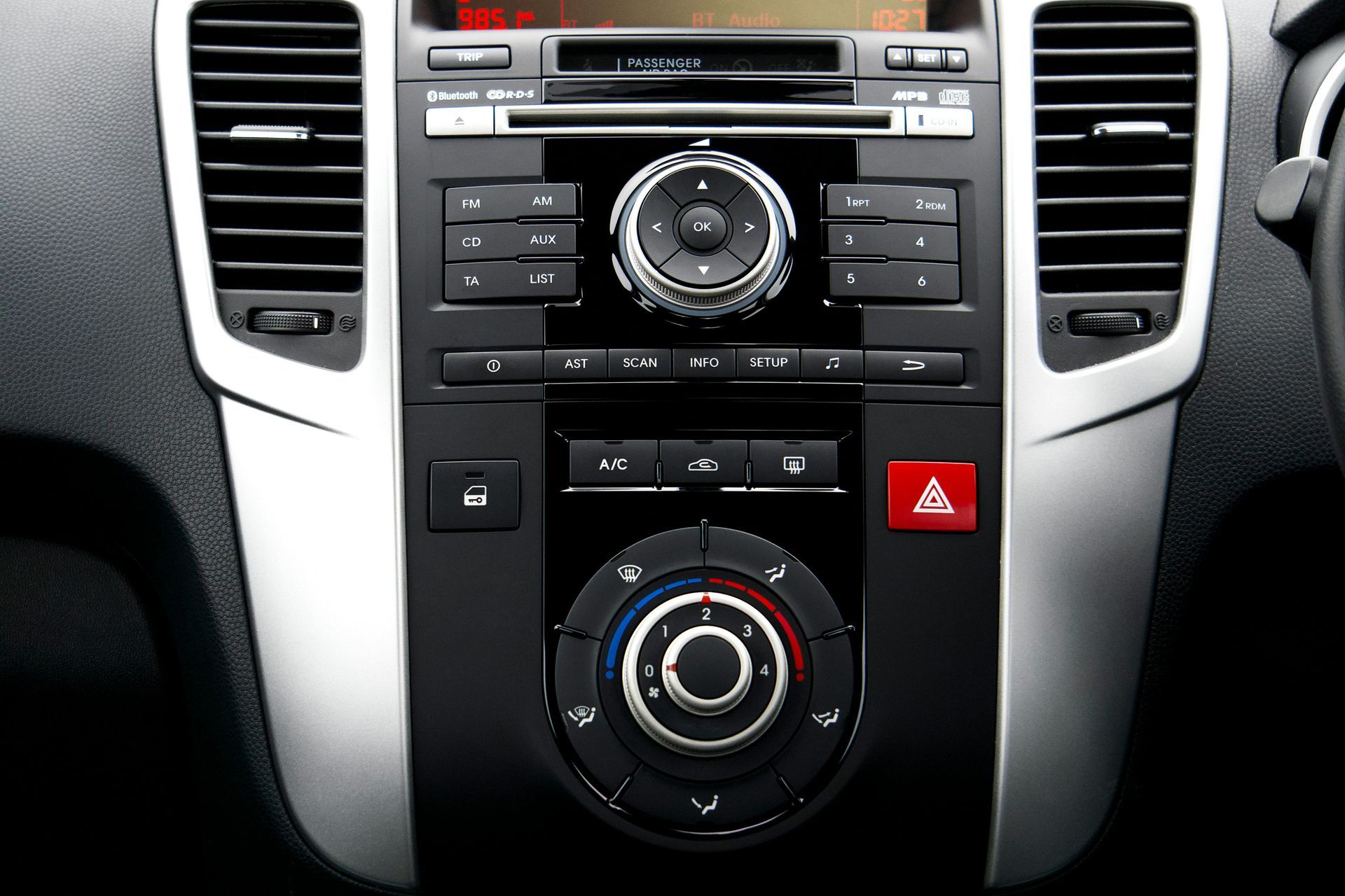 A car dashboard with a red a on it