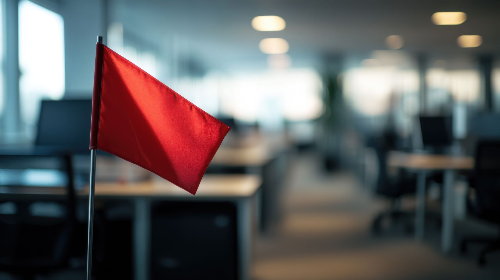 red flag at a desk