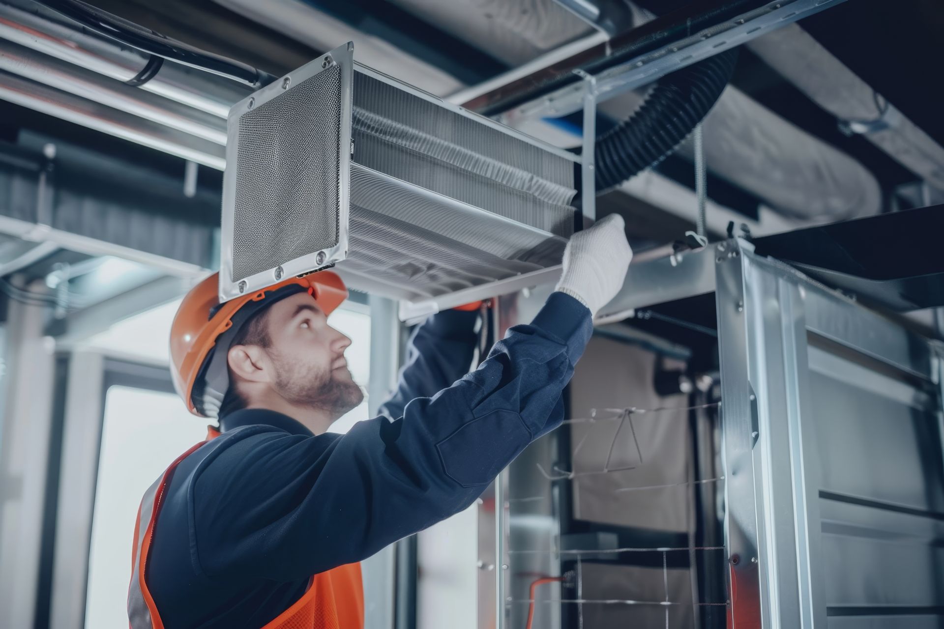 hvac technician replacing parts