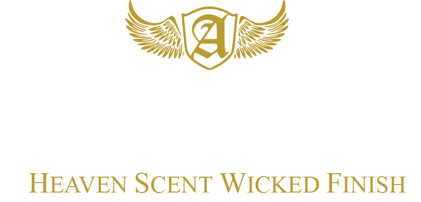 A logo for heaven scent wicked finish with a shield and wings.