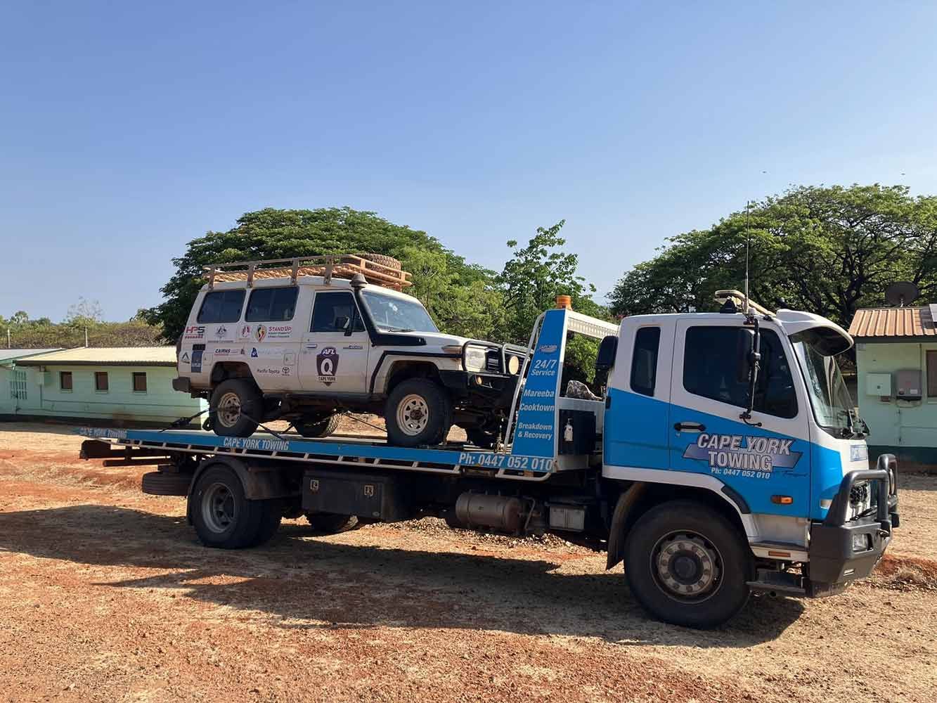 A Tow Truck is Carrying a Jeep on the Back of It — Cape York Towing in Tablelands, QLD