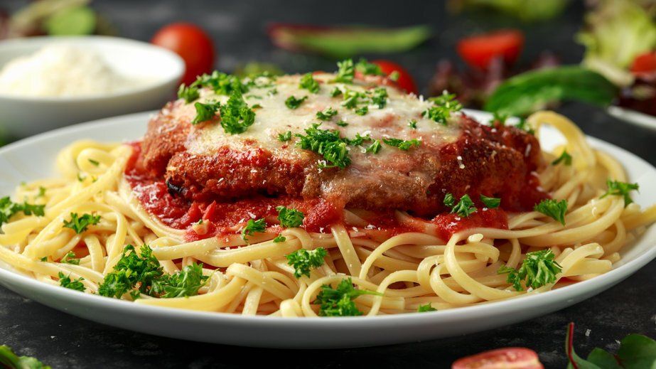 Chicken Parmesan over Linguini