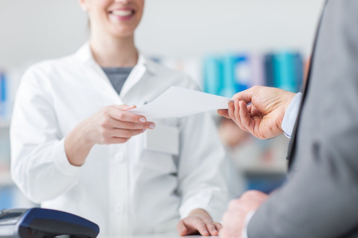 healthcare professionals chatting about insurance