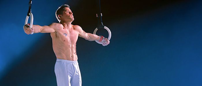 BLAINE WILSON is holding gymnastic rings in his hands.