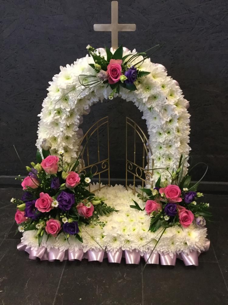 purple and white heart funeral flowers