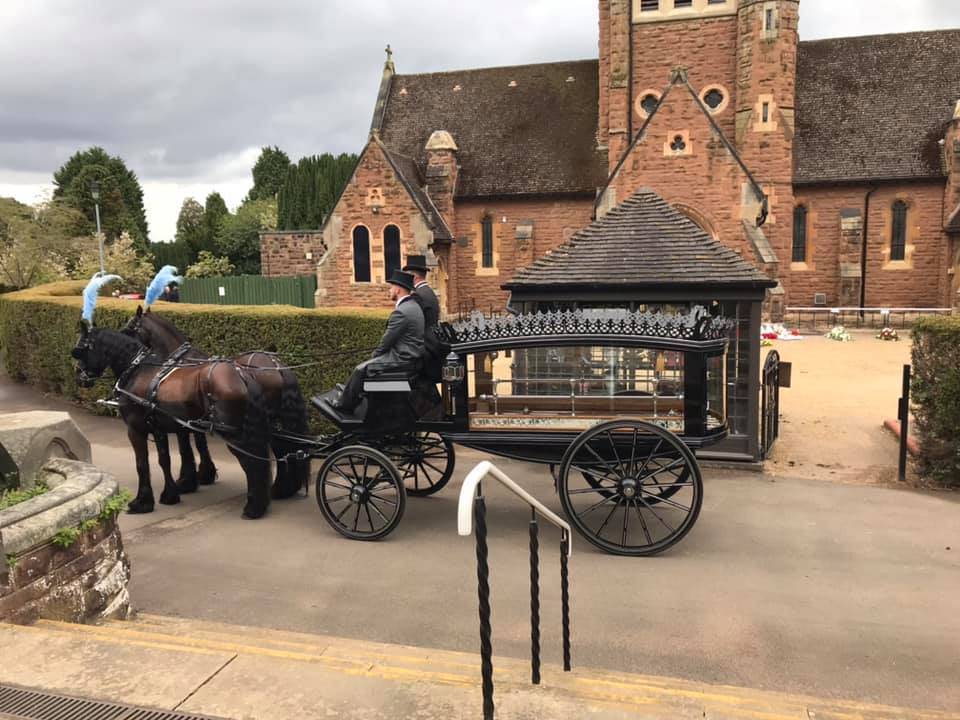 black Horse Drawn Hearse