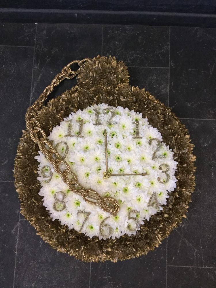 clock shaped funeral flowers