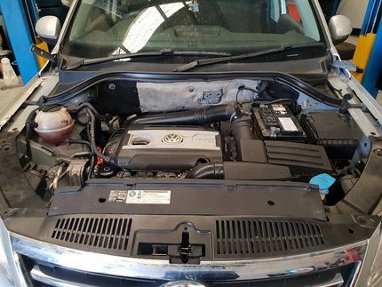 A Person is Working on the Engine of a Car — Maroochy Automotive in Kunda Park, QLD
