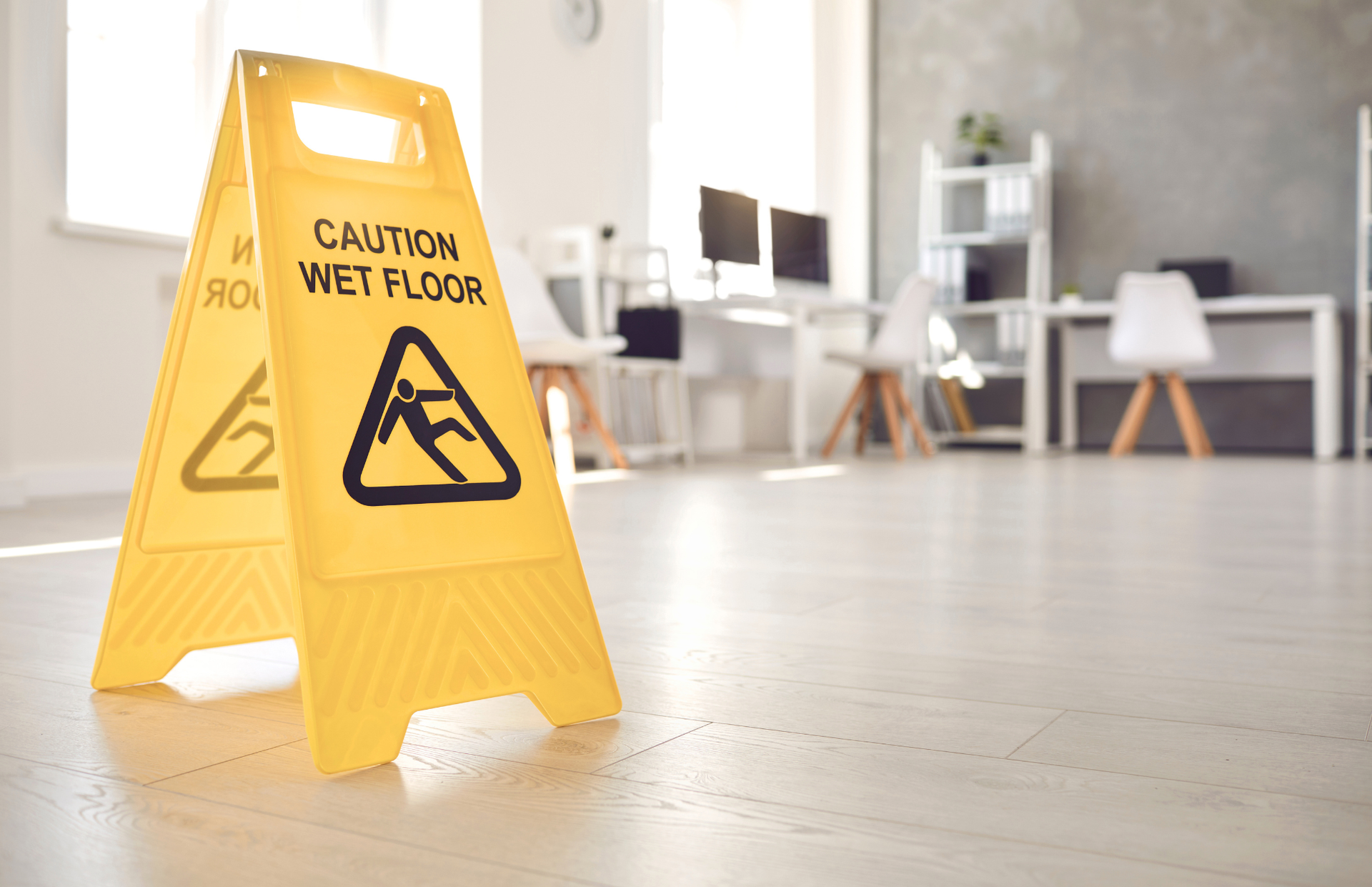 wet floor caution sign at place of business
