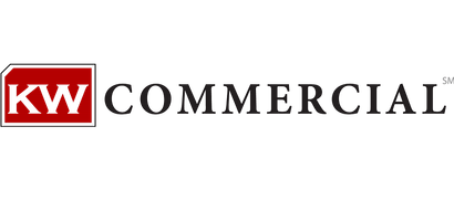 A logo for a real estate company called kw commercial.