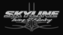 Logo for "Skyline Towing & Recovery" with chrome-style text and intricate pinstripe flourishes on a black background.