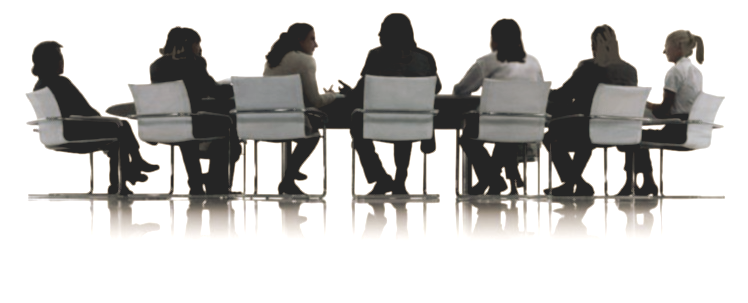 A group of people are sitting around a long table