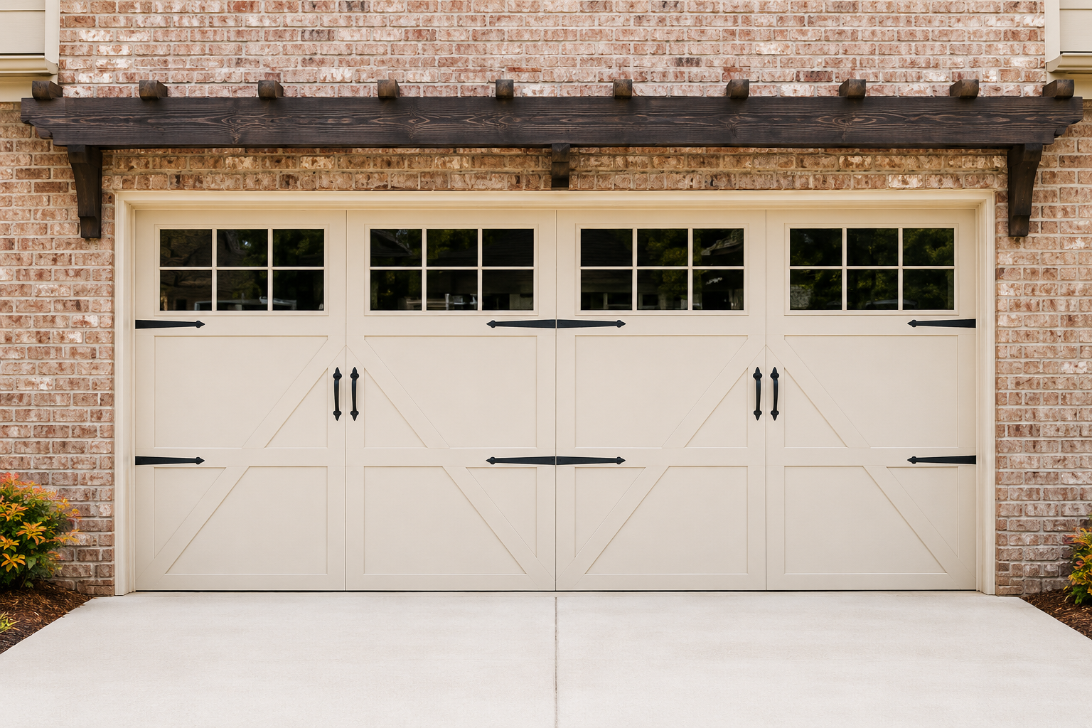 Large cream-colored garage door with small windows set in a brick house facade