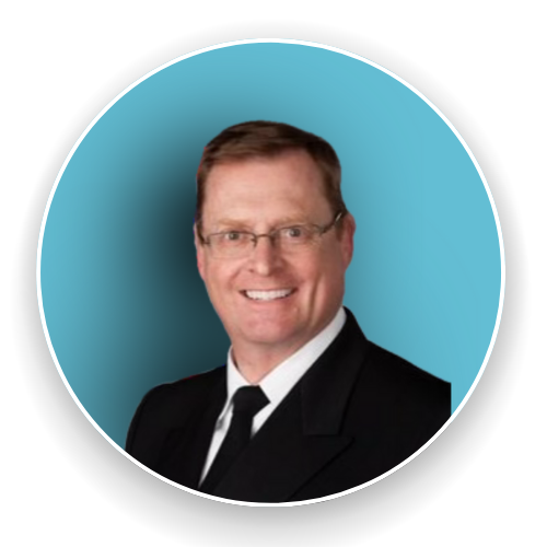 A man in a suit and tie is smiling in a circle