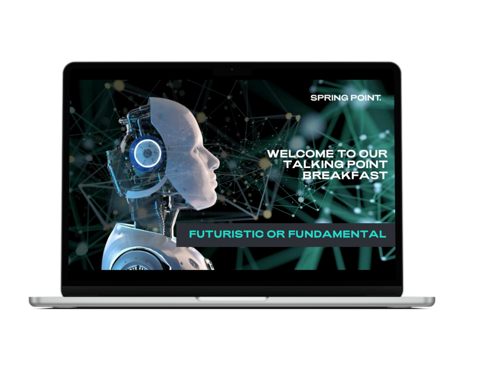 A laptop computer with a picture of a robot on the screen.