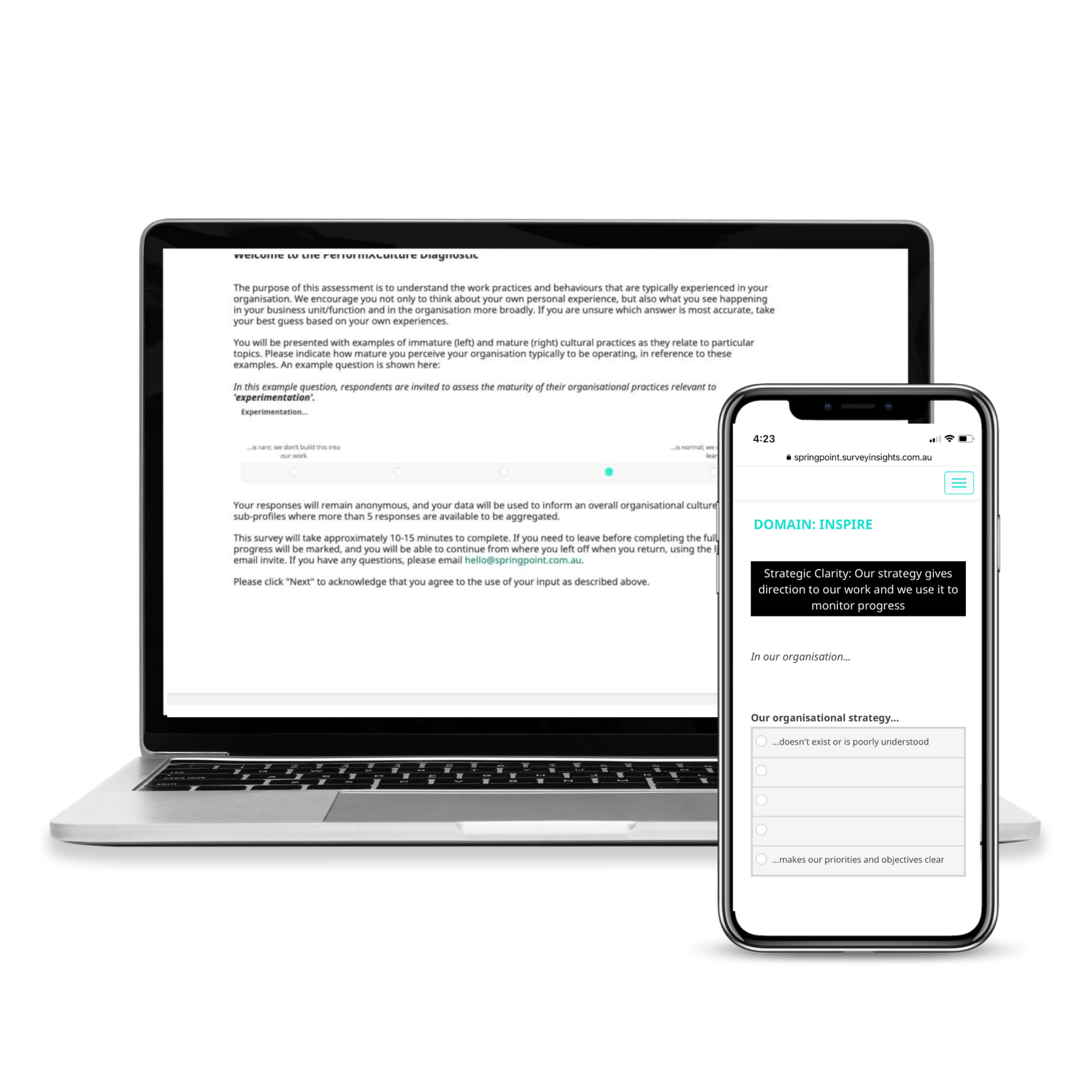 A laptop and a cell phone are sitting next to each other on a white background.