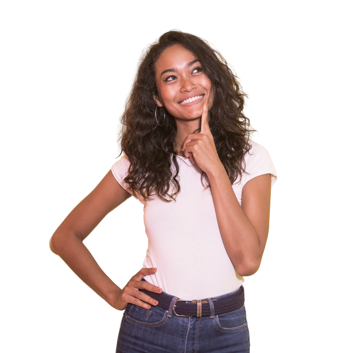 A woman in a white shirt and blue jeans is smiling and thinking