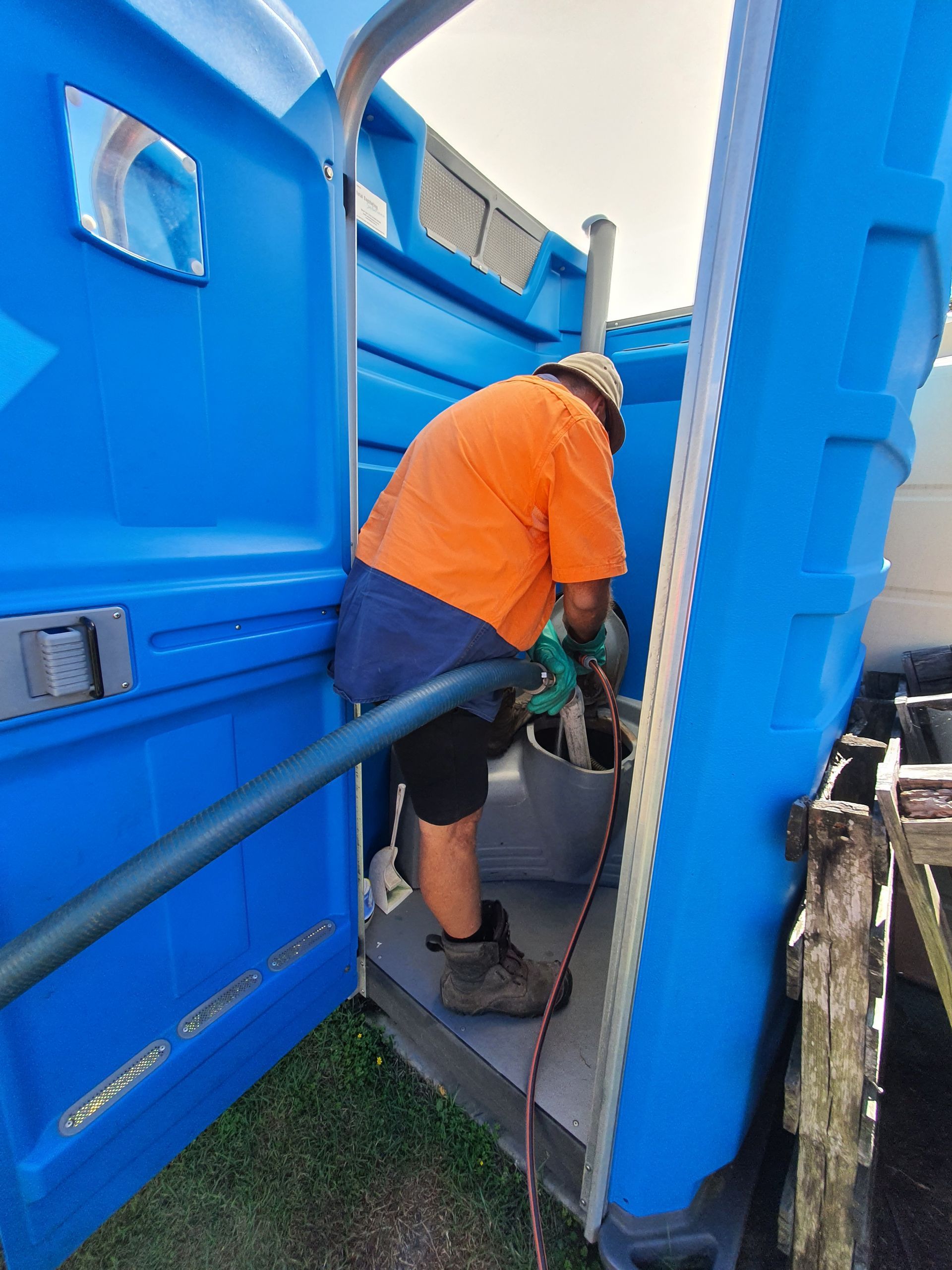 Man Emptying Septic Tank — Waste Disposal in Maryborough, QLD