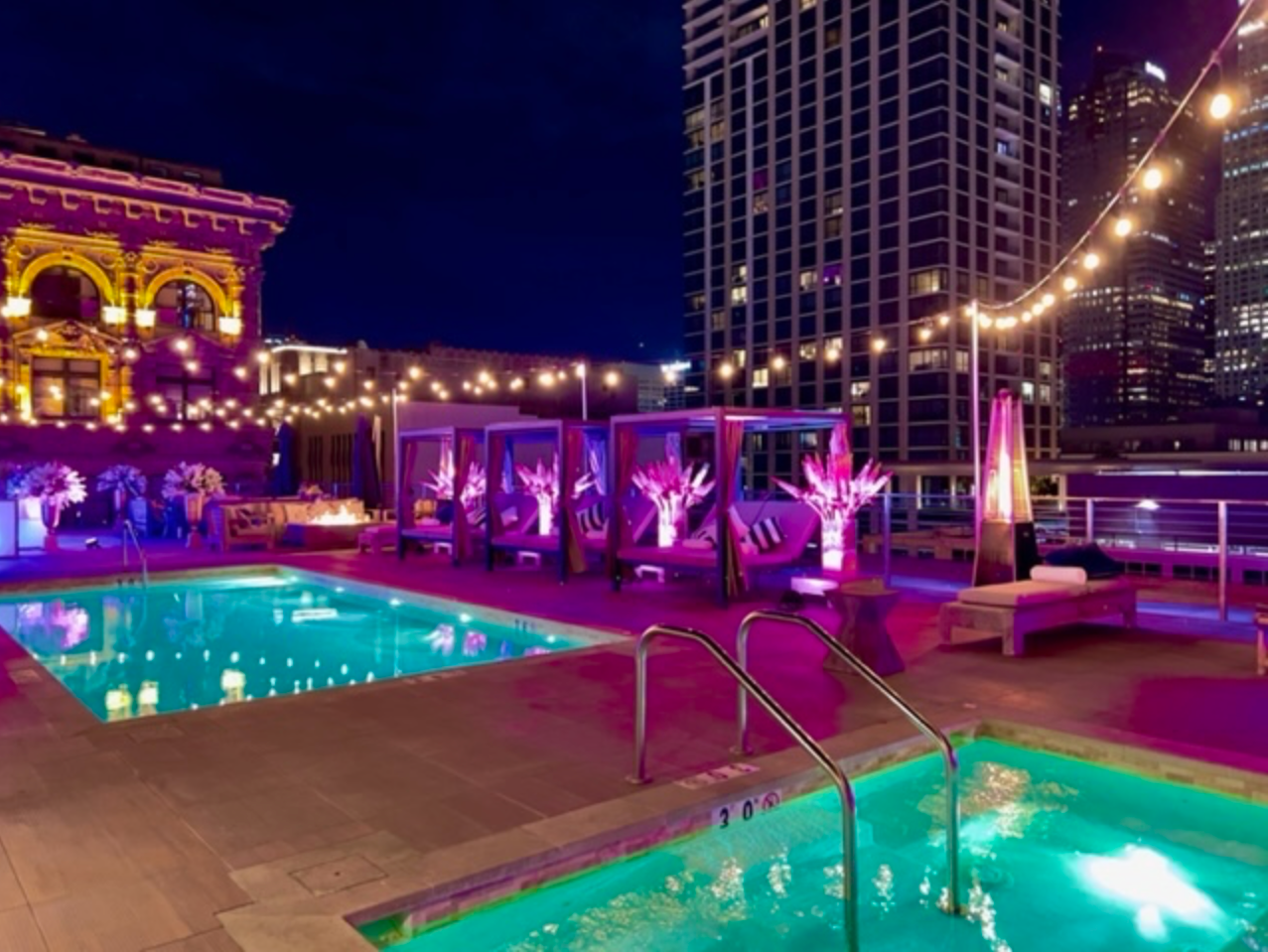 Rooftop pool lounge at HWH Luxury Living in Downtown Los Angeles
