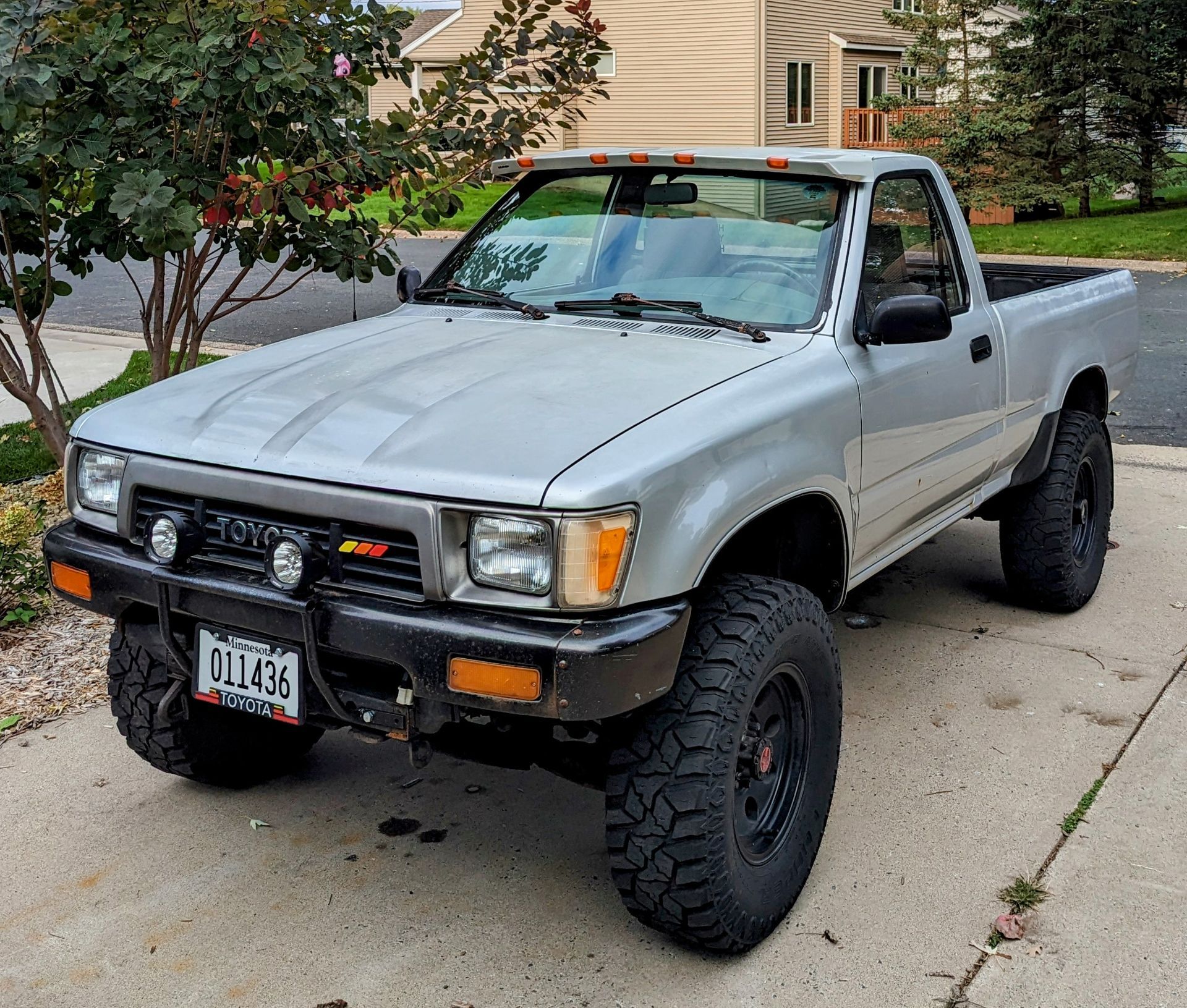 Toyota Truck Parked on the Shop Sidewalk | Evolution Auto Service