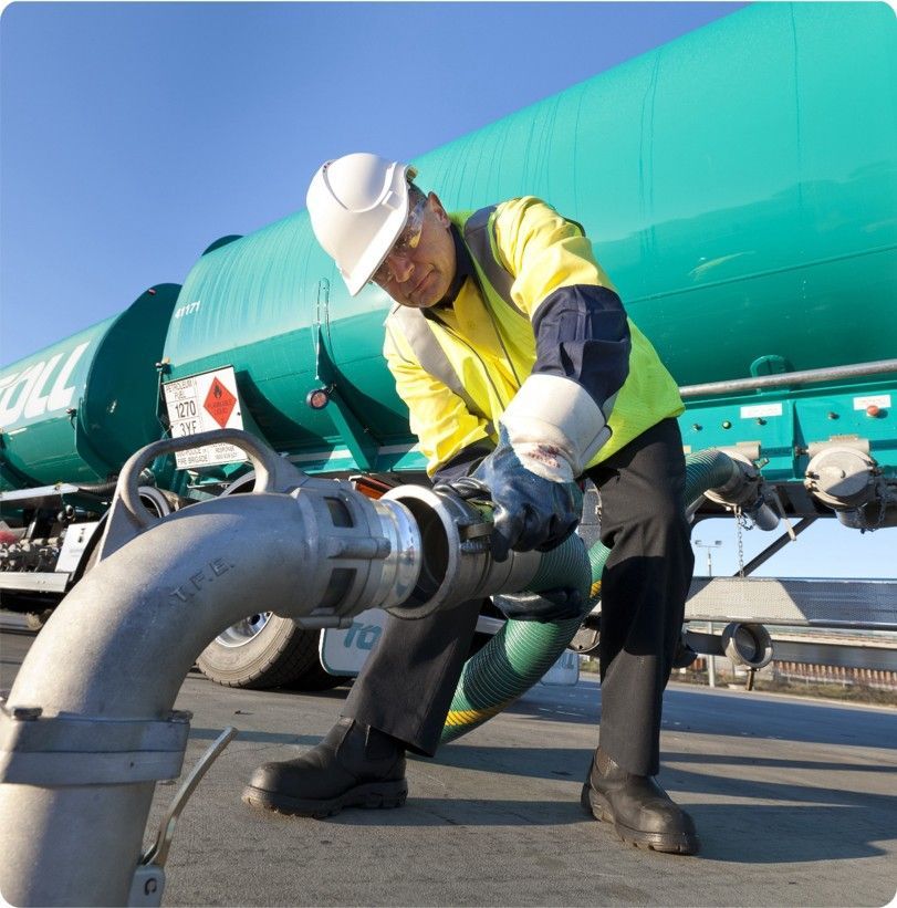 Man holding a fuel line