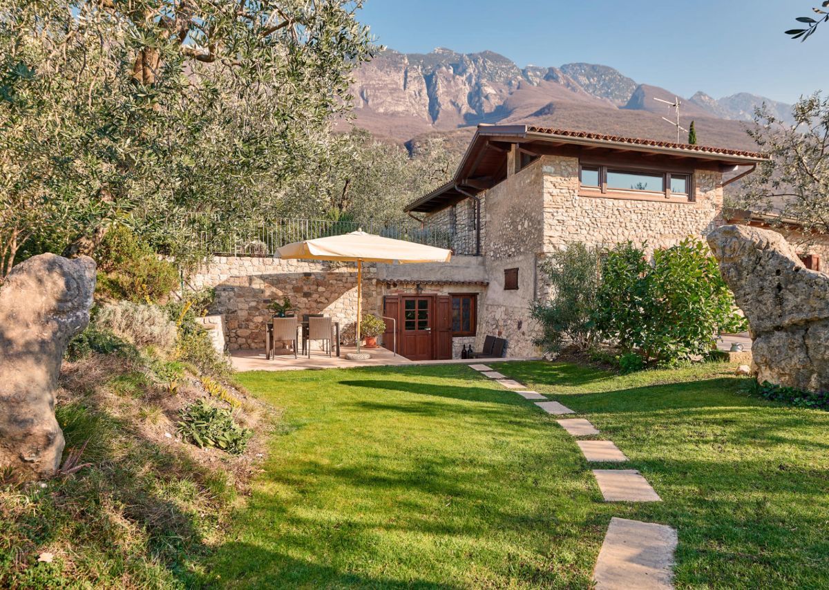Casa con giardino