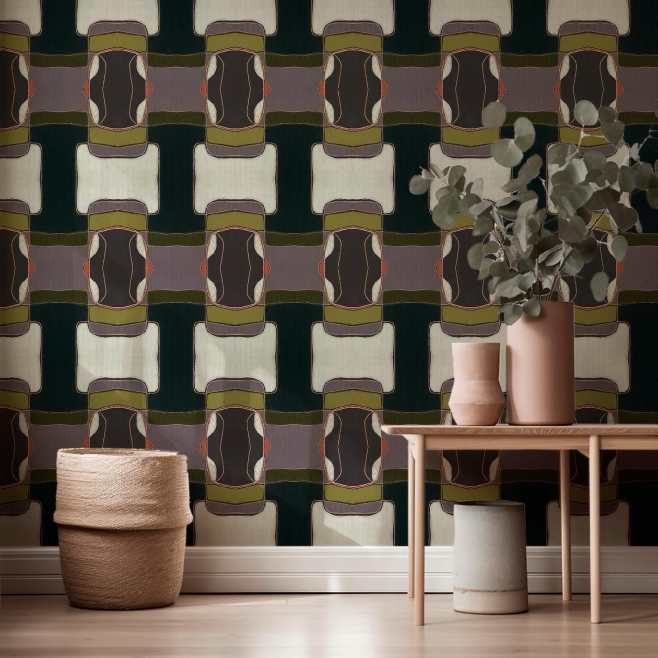 Close-up of folded camouflage fabric with green, brown, and gray geometric pattern