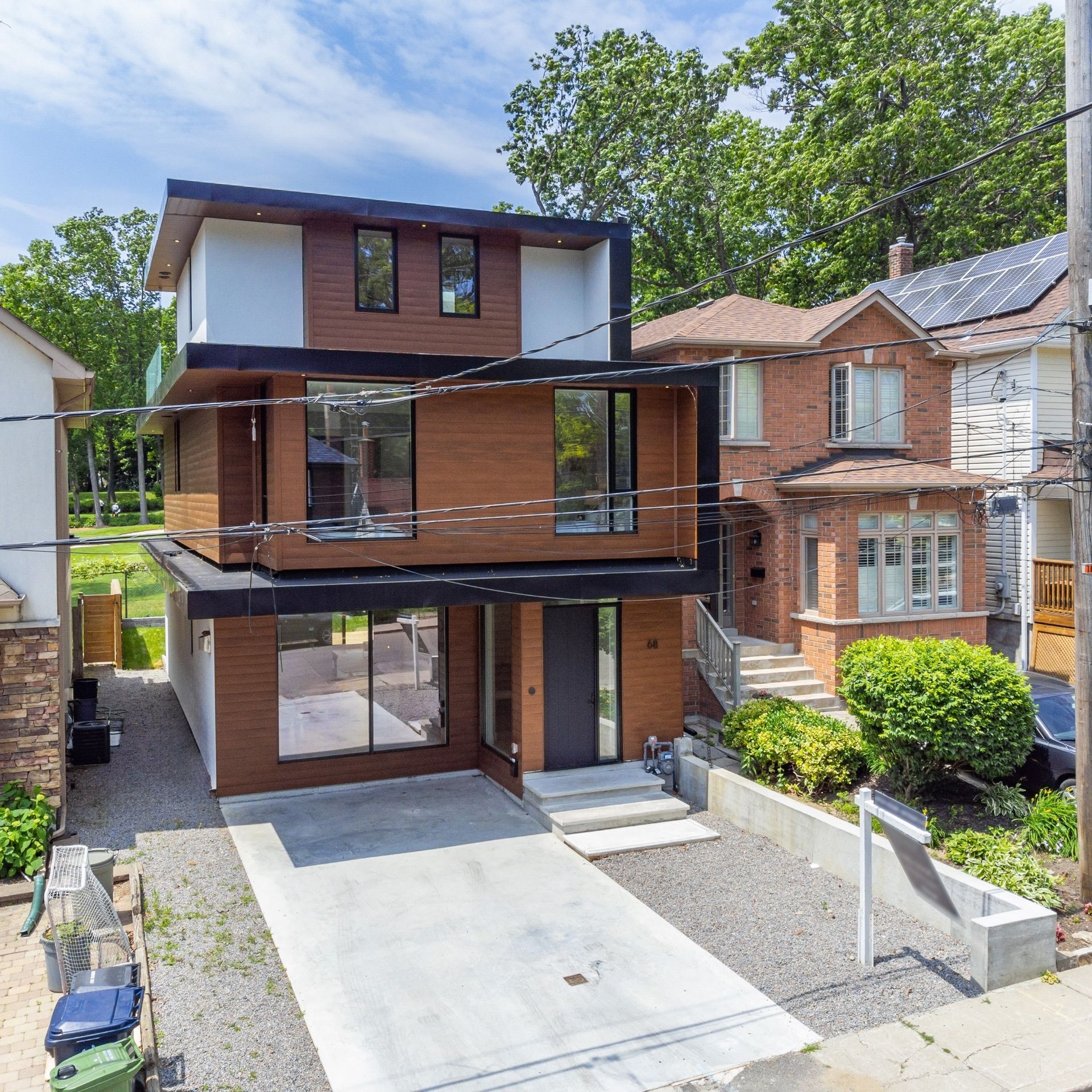 An aerial view of a house with a lot of windows