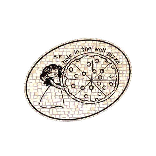 a girl is holding a pizza on a brick wall .