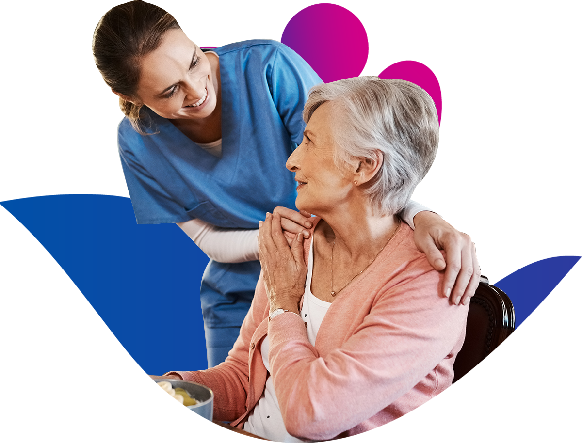 nurse reassuring old lady