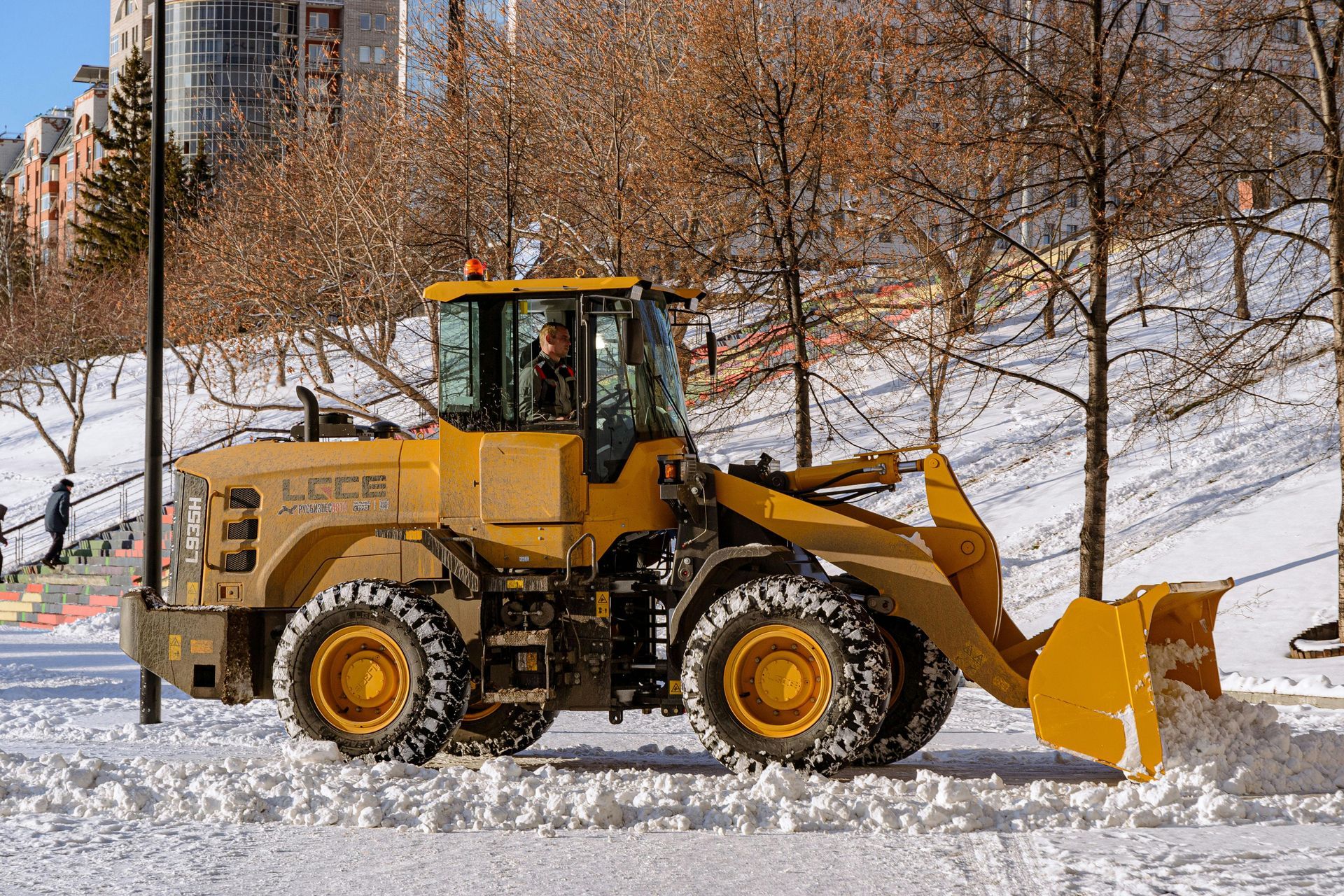 front loader pushing snow