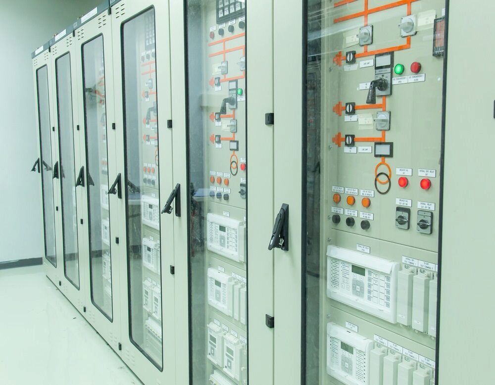 Electrical Control Panels in a Well-lit Room, With Numerous Gauges, Switches— Darwin Electrical Services in Humpty Doo, NT