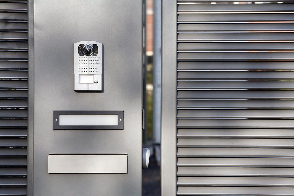 Gray Gate With Intercom, Mailbox, and Address Plate — Darwin Electrical Services in Herbert, NT