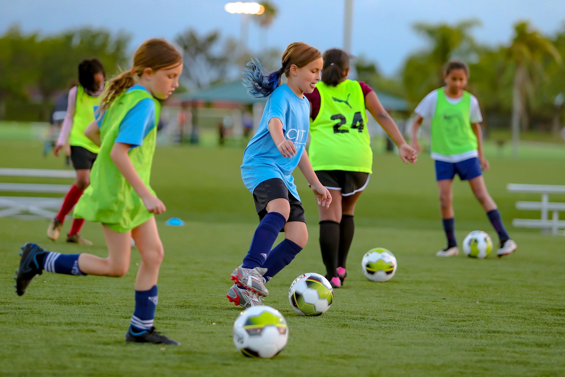 Young Springs Soccer Club players dribbling in a training grid