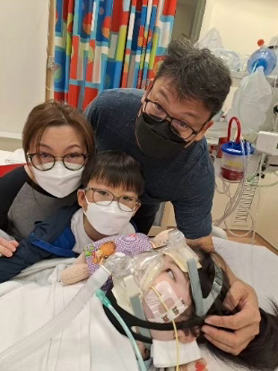 Our family with Katelyn in the last week in ICU 
