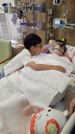 Our family with Katelyn in the last week in ICU 
