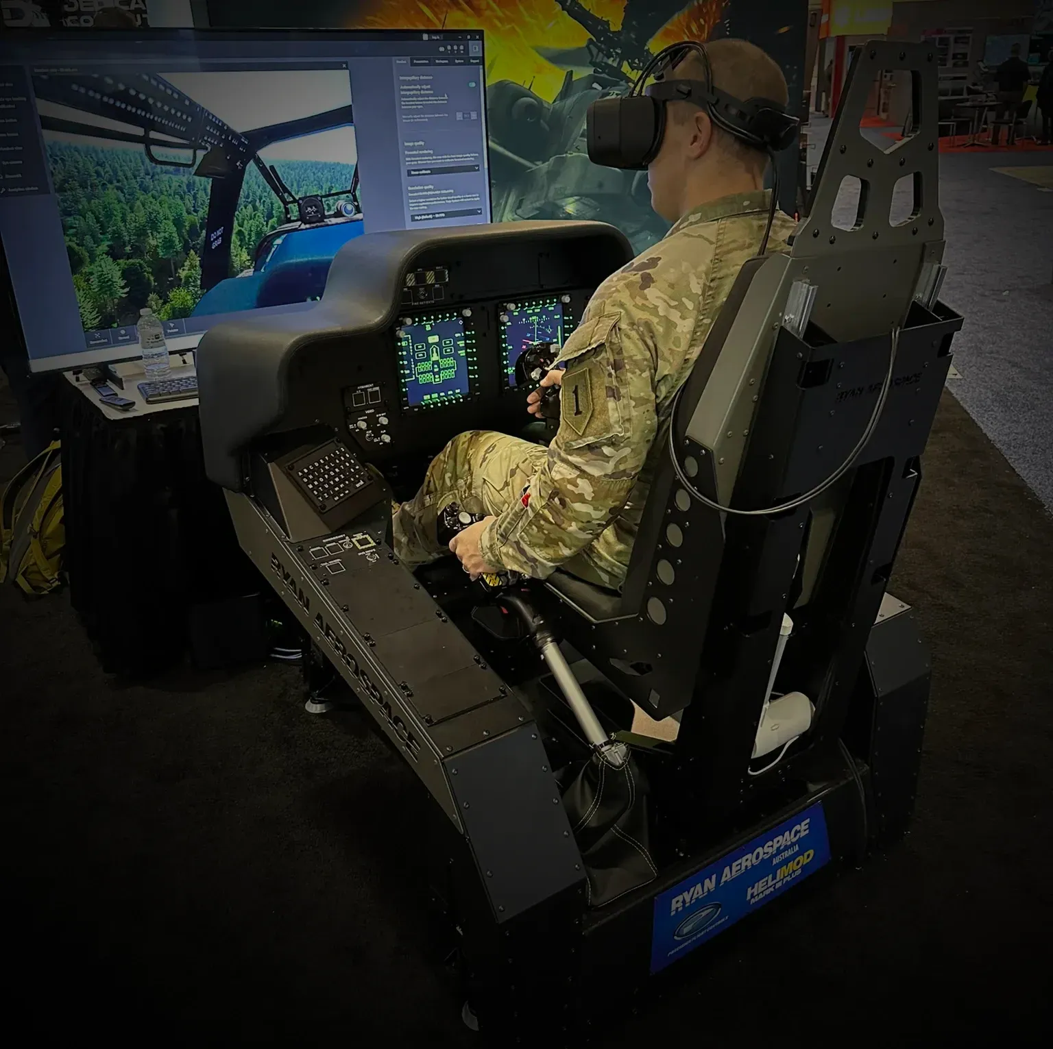 Soldier in the RYAN AEROSPACE AH-64E Apache mission trainer