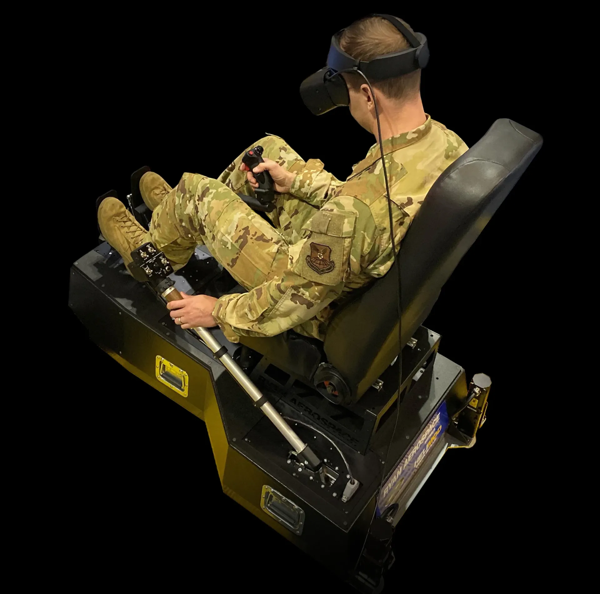 Soldier flying the HELIMOD Mark III PLUS+ helicopter mission trainer at I/ITSEC