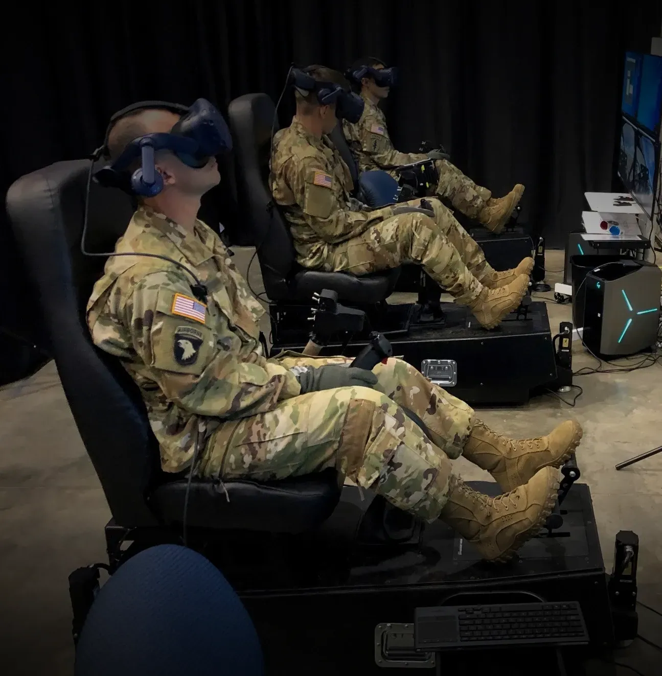 US Army pilots training on RYAN AEROSPACE HELIMOD Mark III helicopter simulators