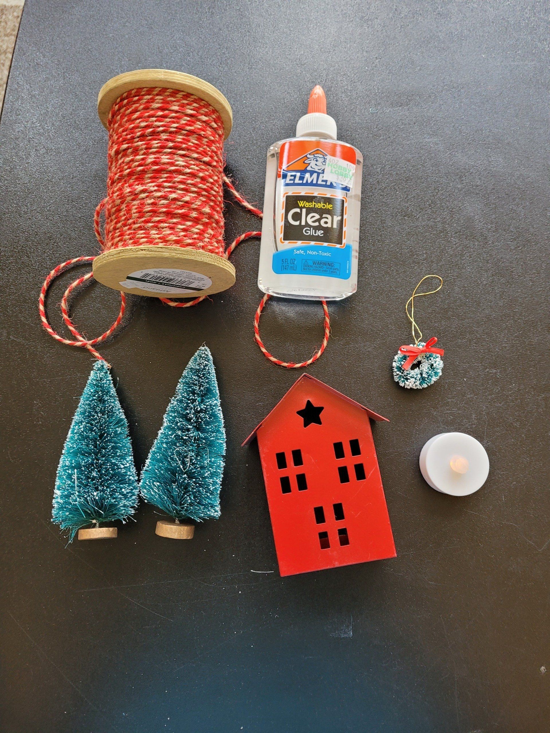 A bottle of elmer 's glue is sitting on a table