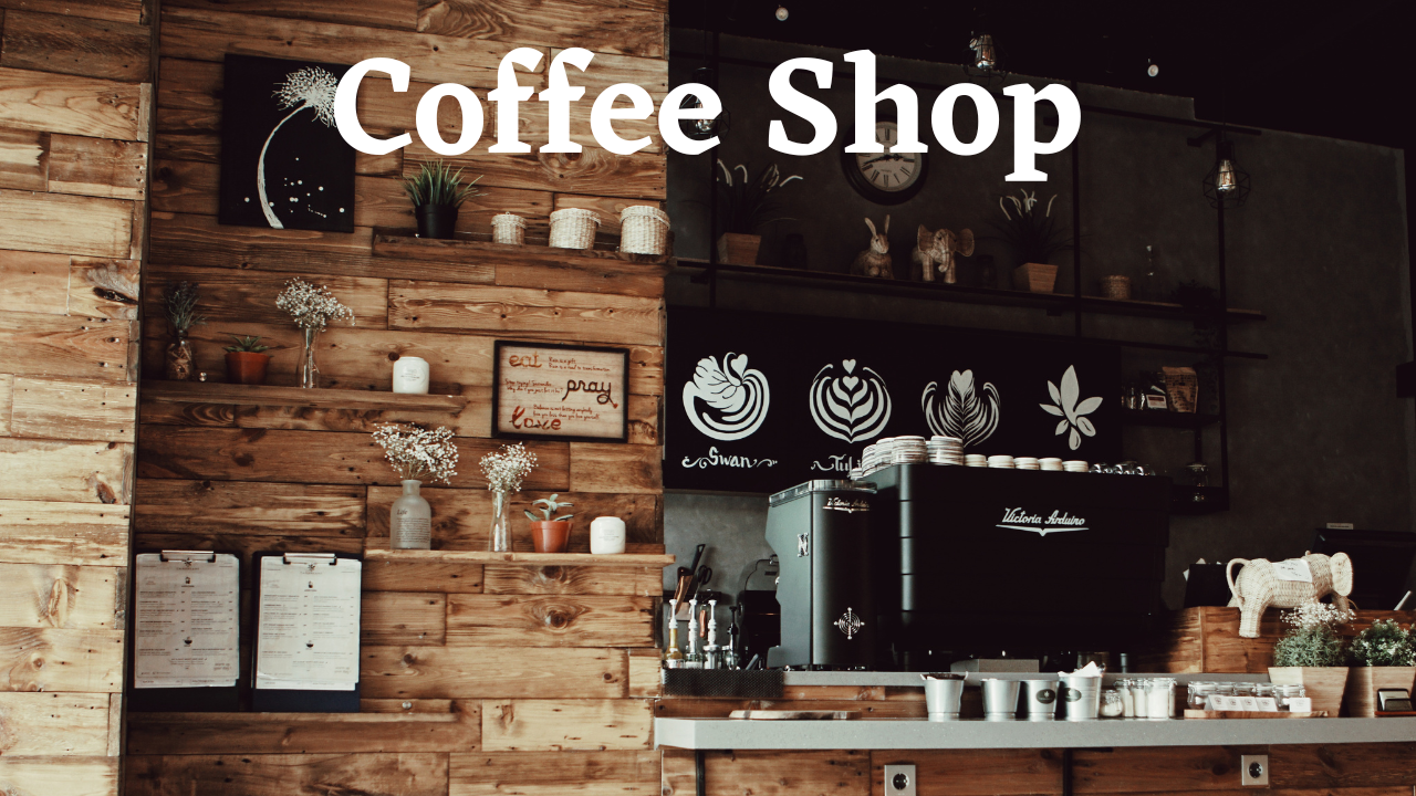 A coffee shop with a wooden wall and a counter.