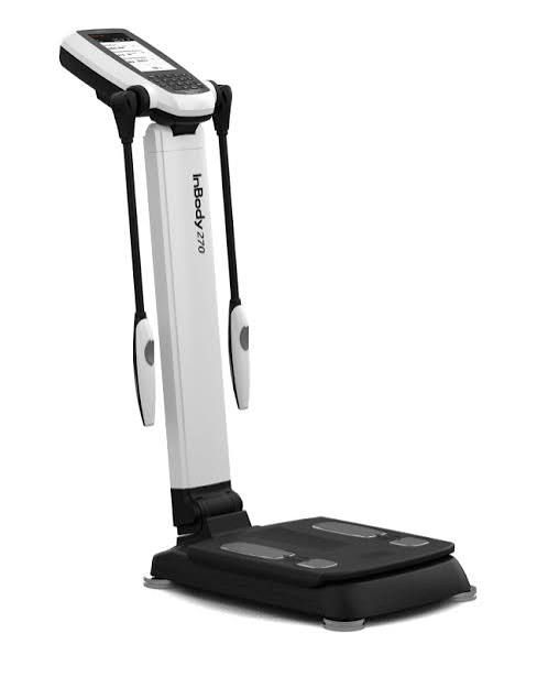 White and black treadmill exercise machine on a white background