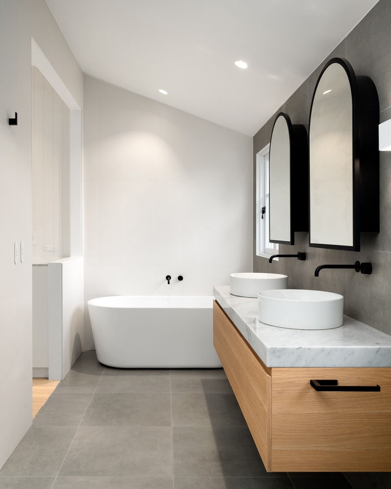A Bathroom With Two Sinks and a Bathtub — Hot Rock Granite In Burleigh Heads, QLD