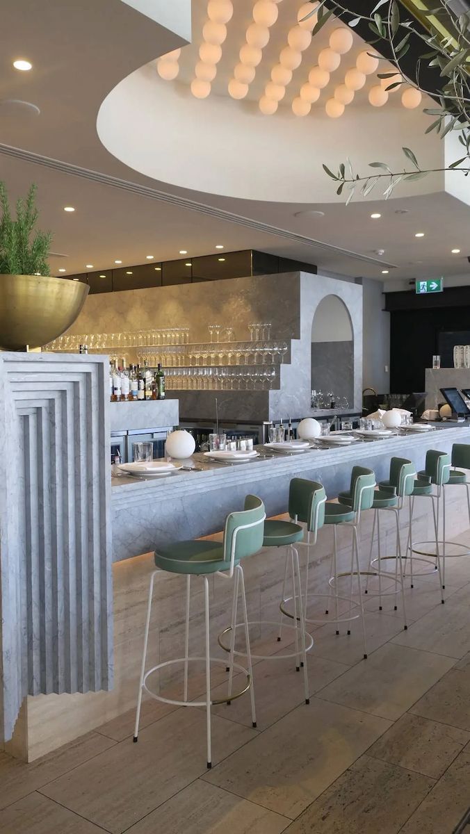 A Restaurant With a Long Counter and Stools — Hot Rock Granite In Burleigh Heads, QLD